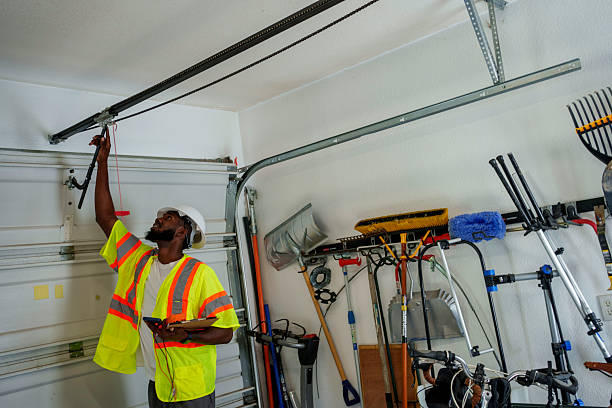 Professional Garage Door Panel Replacement technician working in Alma, MI